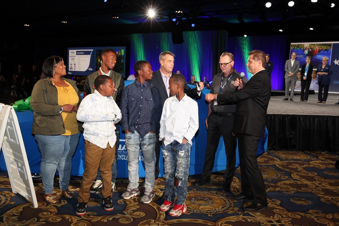 Families Receive Refurbished Vehicles at SEMA