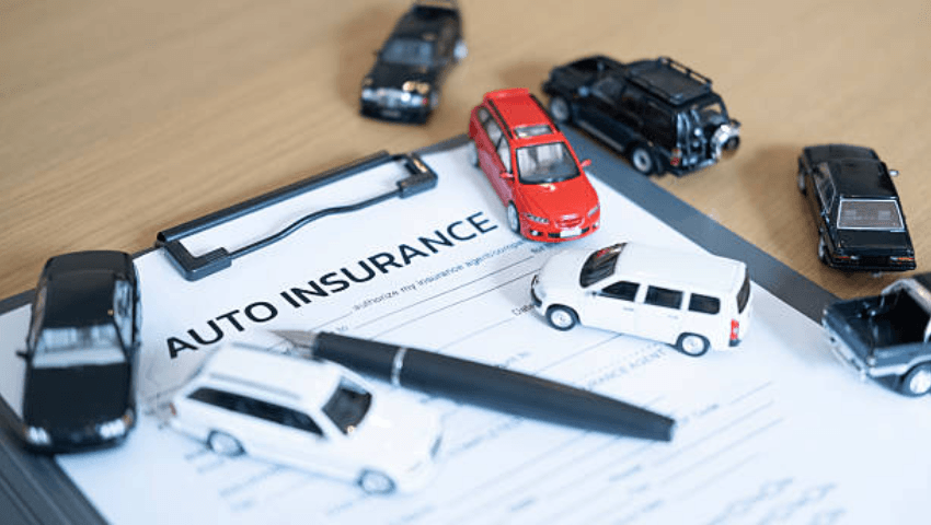 CARSTAR repair center team coordinating with an insurance provider while managing a collision repair claim and vehicle restoration process.